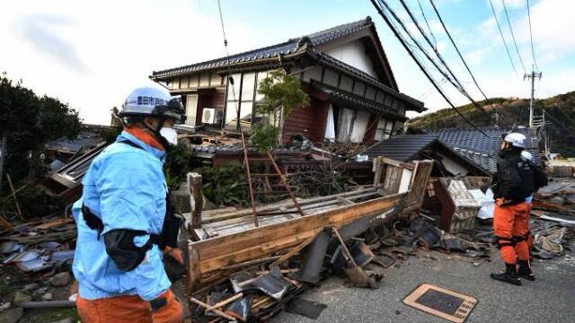 Rescuers search for survivors after a 7.1 quake kills 18 in southwestern Japan